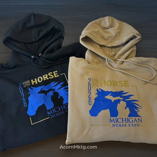 Photo of black and gold hoodies with Michigan Horse Expo Logo