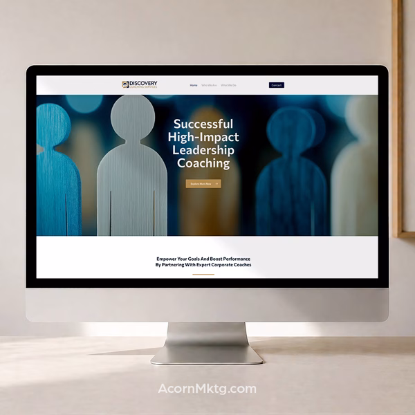 Desktop computer with Discovery Coaching website.